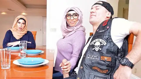 Hijab-wearing Dame Providing A Hand Job From Under The Table